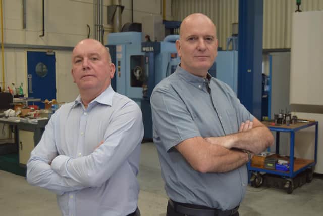 Brothers Mark Long, left, and Vince Long, right, say their family firm has been hit financially after orders dried up. Photo: Tom Cotterill