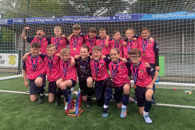 Hawks celebrate their Hampshire Sunday Under-12 Cup win