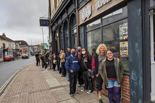 More than 80 customers queued up outside the store this weekend as it held a sale before in-store service resumed on Monday. Picture: Rikki Parsons