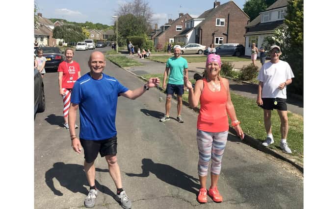Five residents of Roundway in Waterlooville ran a marathon around their street to raise funds for Portsmouth NHS.
Pictured l-r: Karen Darroch, Chris Taylor, Martin Parfitt, Lorraine Taylor and Phil Clarke