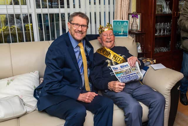News editor Mark Waldron with Jack Dixon on his 100th birthday. Picture: Mike Cooter (030222)