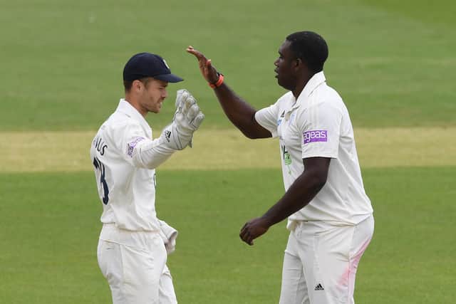 Keith Barker, right, celebrates with Lewis McManus after dismissing Luke Wells of Sussex during this week's friendly at Hove. Photo by Mike Hewitt/Getty Images.