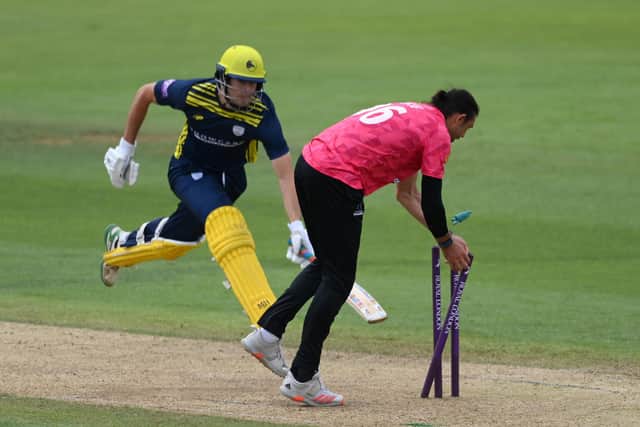 Hampshire's James Fuller is run out after hitting a half-century against Sussex. Photo by Mike Hewitt/Getty Images.