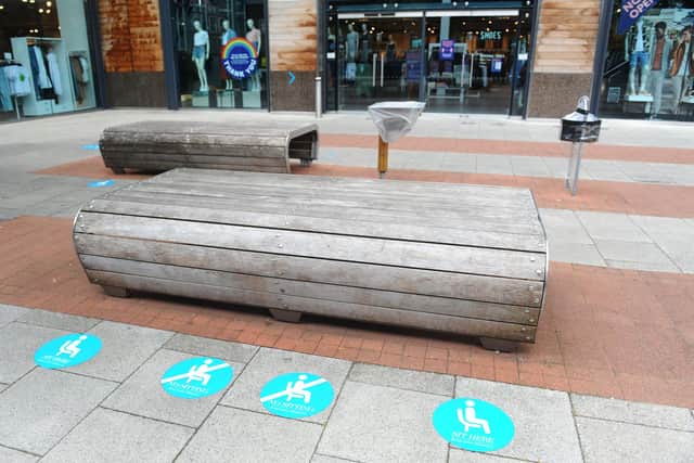 Stickers have also been placed to show where people can sit on benches. Picture: Sarah Standing.