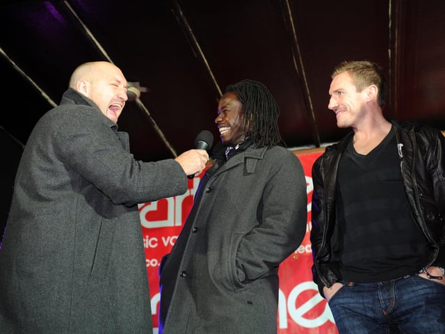 Commercial Road Christmas lights switch on in Portsmouth. Pictured L-R Heart FM's Bunker, Linvoy Primus and Pompey captain Liam Lawrence in 2011.  Picture: Paul Jacobs (114102-8)