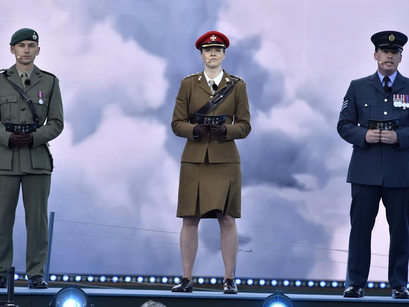 Captain Lewis Kelly represented the Royal Navy alongside members of all Armed Forces during the D-Day 80 commemorations on Southsea Common. Pictured is: (l-r) Cpt Lewis Kelly (Royal Marines), Lt Felicity Villar (Army) and FS Dai Lawrence (RAF). Picture: Sarah Standing (050624-3642)