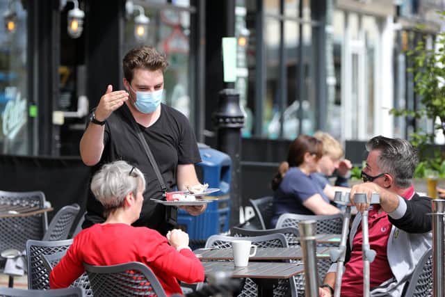 Mask wearing requirement for waiting staff, in Palmerston Road, Southsea. Picture: Chris Moorhouse (jpns 030721-20)