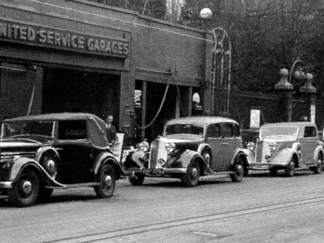 Smart cars in the High Street, Old Portsmouth. United Service Garages.  Picture: Dave Roberts collection.