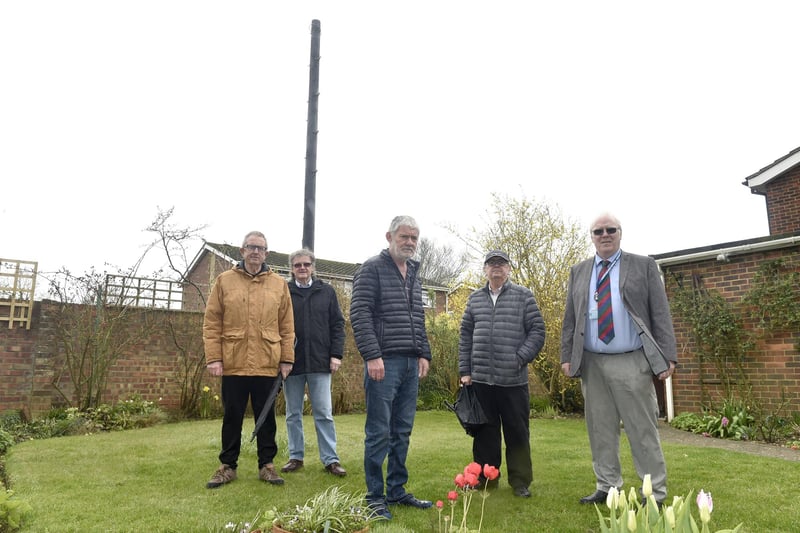 John Rowlands from Woodside, Gosport, is angry that Toob has installed an "eyesore" telegraph pole meters from his garden without prior consultation. Pictured is: Residents of Woodside in Gosport (l-r) Chris Morgan, Barry Robertson, John Rowlands, John Huckle and cllr. Steve Hammond. Picture: Sarah Standing