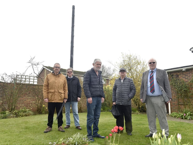 John Rowlands from Woodside, Gosport, is angry that Toob has installed an "eyesore" telegraph pole meters from his garden without prior consultation. Pictured is: Residents of Woodside in Gosport (l-r) Chris Morgan, Barry Robertson, John Rowlands, John Huckle and cllr. Steve Hammond. Picture: Sarah Standing