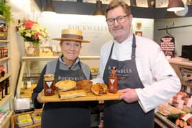 Helen and John Buckwell with some of the pies they make and sell at their butchers shop, Buckwells of Southsea. Picture: Sarah Standing (250220-8736)