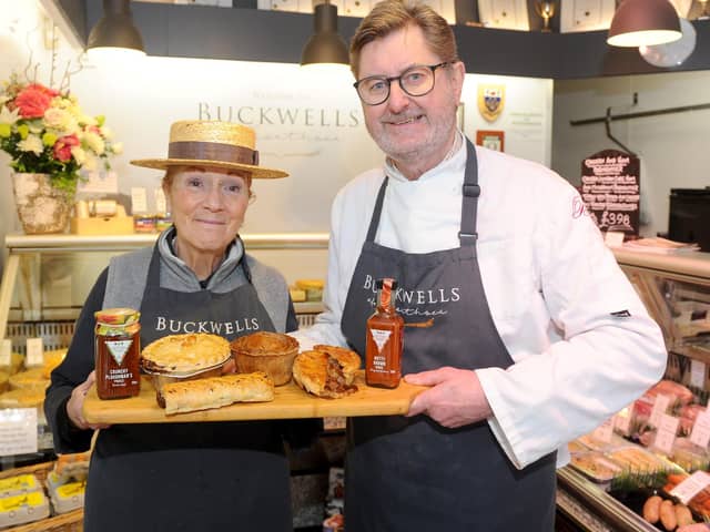 Helen and John Buckwell with some of the pies they make and sell at their butchers shop, Buckwells of Southsea. Picture: Sarah Standing (250220-8736)