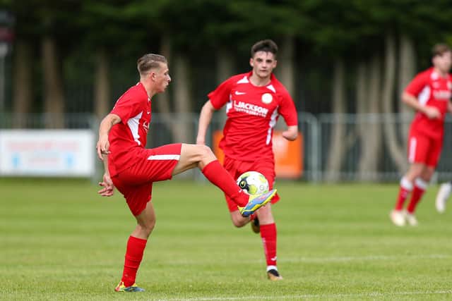 Zak Willett, left, in action for Horndean against Hartley Wintney in a pre season friendly. Picture: Chris Moorhouse