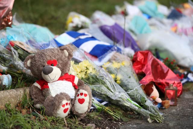 Tributes left outside the home of Arthur Labinjo-Hughes in Solihull, West Midlands. Emma Tustin was jailed for life with a minimum term of 29 years at Coventry Crown Court on Friday for cruelly starving, poisoning and then murdering her six-year-old stepson Arthur Labinjo-Hughes. Picture date: Saturday December 4, 2021.