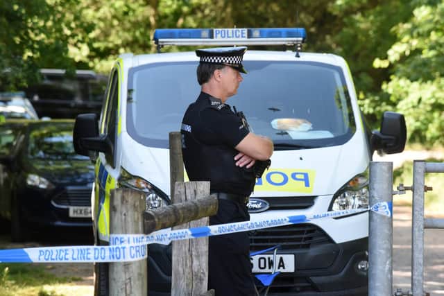 Police at the scene of Havant Thicket where the body of Louise Smith was found. Picture: Simon Czapp/Solent News & Photo Agency