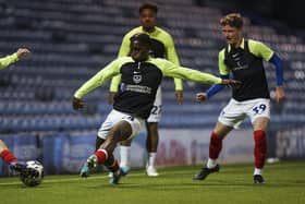 Brian Quarm (left) and Dan Murray (right) warm-up before Pompey's Papa John's Trophy match with Aston Villa Under-21s. Picture: Jason Brown/ProSportsImages