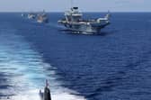 The UK Carrier Strike Group sailing with the NATO Standing Maritime Group. F-35s can be seen on the flight deck of HMS Queen Elizabeth in the background. Picture: LPhot Unaisi Luke