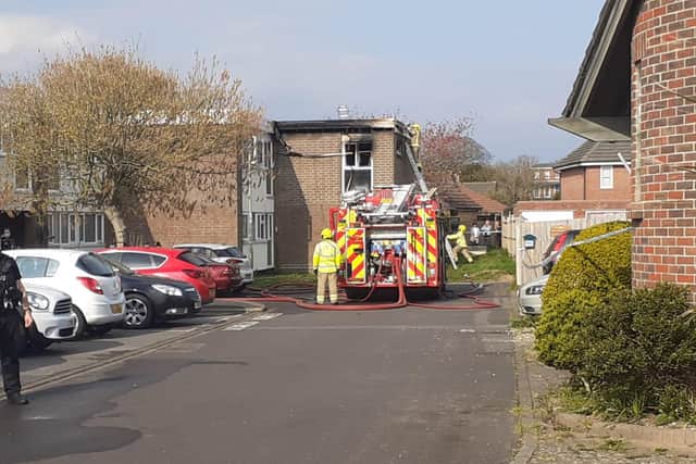 Firefighters look to ensure the flat and surrounding properties are safe for residents to return to.