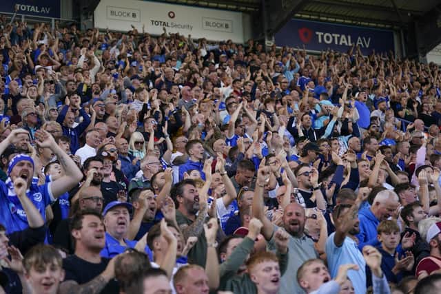 The Fratton End showing their passion during the win against Lincoln. Pic: Jason Brown.