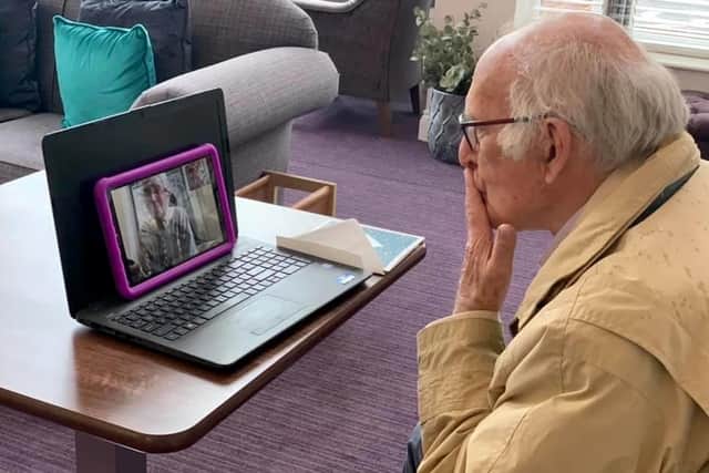 Mac McLennan blowing kisses to his wife Cynthia. Pictures: Denmead Grange care home.