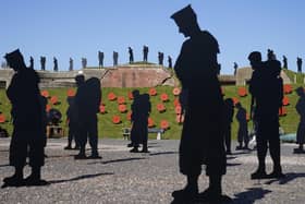 A view of silhouettes which are part of the Standing With Giants art installation at the Royal Armouries Fort Nelson in Portsmouth. The outdoor installation features life-size silhouettes of the 258 military personnel and civilians who lost their lives in the Falklands Conflict. Picture date: Thursday April 20, 2023. PA Photo. See PA story ARTS Falklands. Photo credit should read: Andrew Matthews/PA Wire