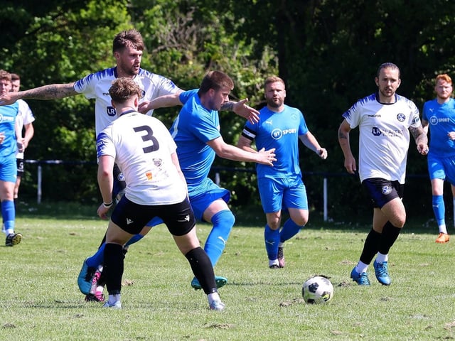 Paulsgrove (blue) v Clanfield. Picture: Sam Stephenson.