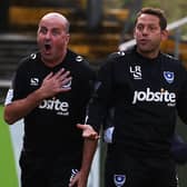 Former Pompey boss Paul Cook alongside Leam Richardson. Picture: Joe Pepler