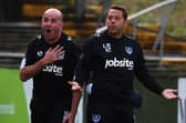 Former Pompey boss Paul Cook alongside Leam Richardson. Picture: Joe Pepler