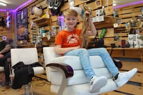 Eight-year-old Beau Vowles from North End had his long hair cut off for the Little Princess Trust and Great Ormond Street Hospital