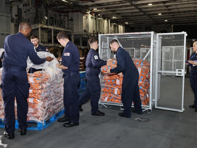 Sailors preparing HMS Queen Elizabeth ahead of the Autumn deployment.