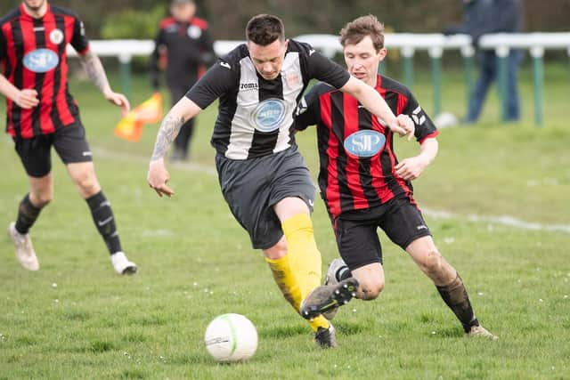 Luke Wheatcroft (black/white) will make his first Hayling appearance of the season at Moneyfields on Tuesday in the quarter finals of the Portsmouth Senior Cup. Picture: Keith Woodland
