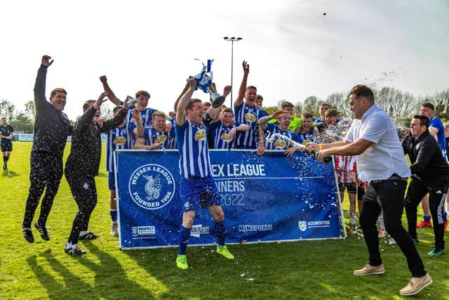 Shaftesbury lift the Wessex League Cup trophy Picture: Mike Cooter (300422)