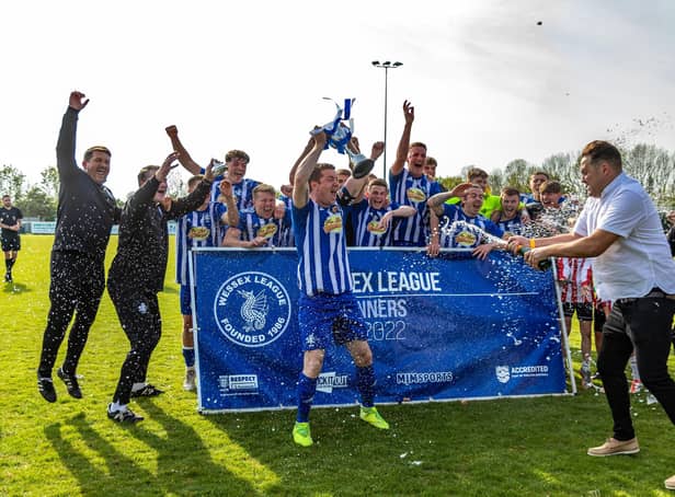 Shaftesbury lift the Wessex League Cup trophy Picture: Mike Cooter (300422)