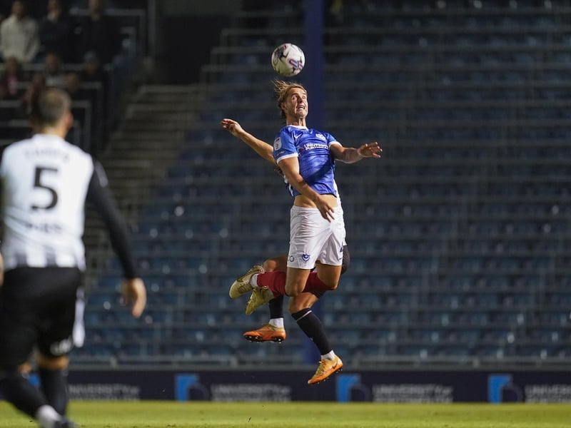 Ryley Towler wins an aerial battle in Pompey's 5-1 victory over Gillingham in the EFL Trophy. Picture: Jason Brown/ProSportsImages