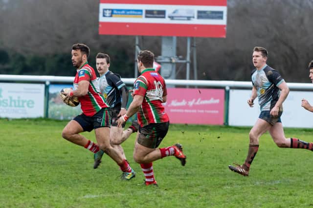 Petersfield's Greg Jansen, with the ball, was among the try scorers in the win against Shanklin. Picture: Vernon Nash