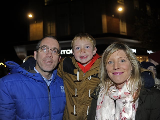 Hundreds of people saw the christmas lights switch on at Commercial Road, Portsmouth in 2016. (left to right), Darren Jones and partner Jackie Browning from Fratton and Jake Hyde-Browning (eight). Picture Ian Hargreaves (161295-7)