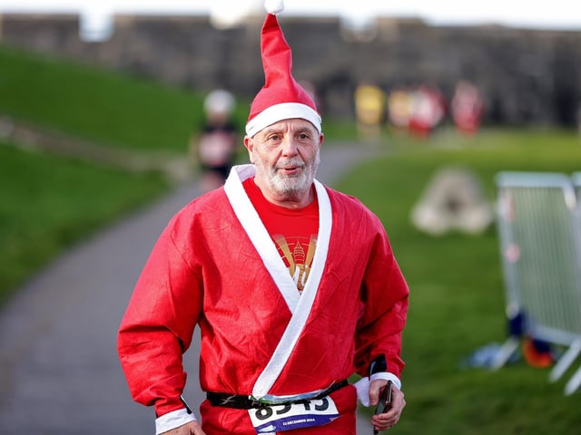A number of runners took to the picturesque coastal route to take on the Portsmouth Coastal Waterside Marathon, Festive Half Marathon, as well as the Southsea 5k and 10k Turkey Trot. Picture: Chris  Moorhouse (221224-72)