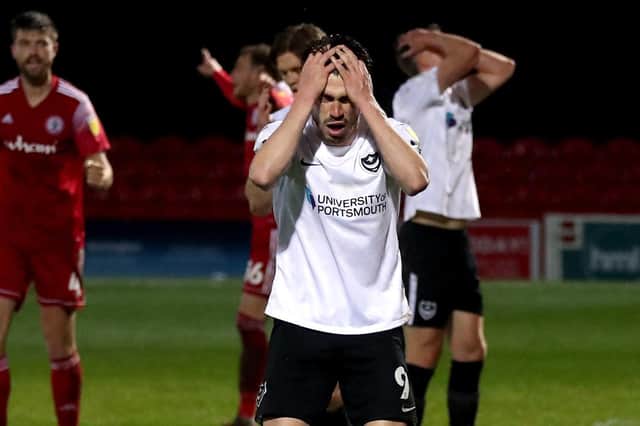 Portsmouth's John Marquis reacts after scoring an own goal during the Sky Bet League One match at Wham Stadium, Accrington. Picture date: Tuesday April 27, 2021. PA Photo. See PA story SOCCER Accrington. Photo credit should read: Martin Rickett/PA Wire.