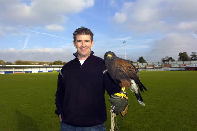 Shaun Gale pictured with Morgana the hawk prior to Hawks' FA Cup first round tie with Millwall in 2006. Pic: Paul Jacobs.