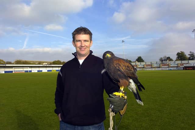 Shaun Gale pictured with Morgana the hawk prior to Hawks' FA Cup first round tie with Millwall in 2006. Pic: Paul Jacobs.
