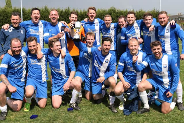 Watersedge celebrate their London Cup final win in 2016/17.