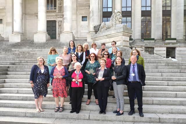 The long service award recipients on Guildhall steps.