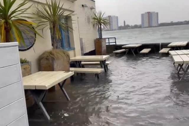 Screenshot of a video showing flooding in the beer garden of The Still and West in Old Portsmouth. Picture: Tony Groom