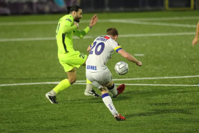 Tommy Wright nets Hawks' consolation against Dorking from outside the penalty area. Picture: Dave Haines