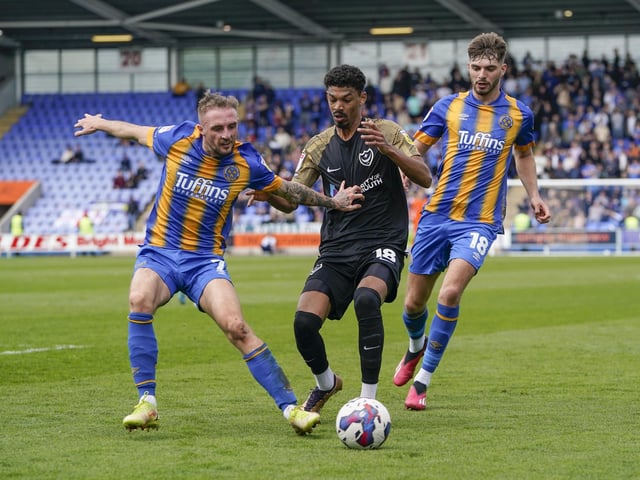 Reeco Hackett is put under pressure by the Shrewsbury defence