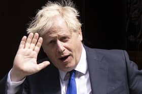 Prime minister Boris Johnson leaves 10 Downing Street for PMQs on July 6.