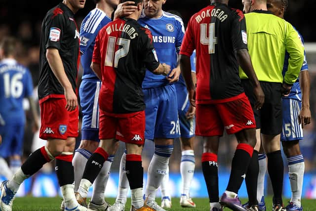 John Terry speaks with Ryan Williams after fouling the winger in the FA Cup encounter at Chelsea in January 2012, ending in a 4-0 defeat to Pompey. Picture: Nick Potts