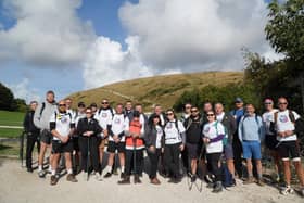 Mammoth walk along the Jurassic Coast raised more than £27,000 in fight against cancer.