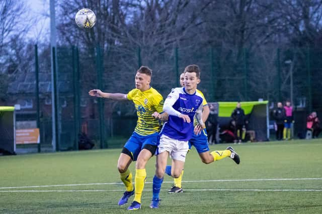 Denmead (blue) v Locks Heath. Picture by Alex Shute