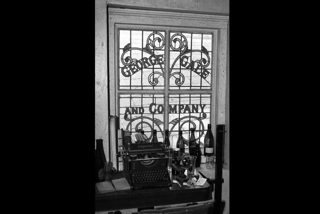 Gales Brewery at Horndean 3rd October 2003. Stained glass window and old-style typewriter. Picture: David Garvey 033382-11